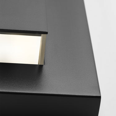 Close-up of the Aspen 26" outdoor wall sconce showing its sleek design and acrylic lens.
