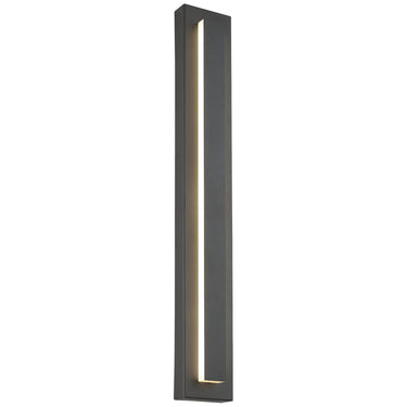Aspen 36" LED outdoor wall light, Charcoal, mounted on a brick wall, providing warm light. 