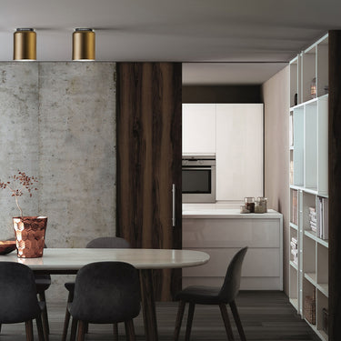 Aspen C ceiling lamps in brass over a dining table