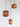 Natural Ausi cardboard pendants by Graypants hanging together as a cluster in a styled interior