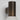 Close-up of the brushed bronze body of the Torres wall light above its honed alabaster shade