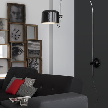 Mid-century modern wall sconce by Oluce with chrome-plated metal structure