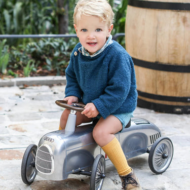 Toddler push car in Audi roadster style with extended wheels and ergonomic seating
