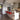 Modern Besa Bana frost glass pendant hanging above a dining table