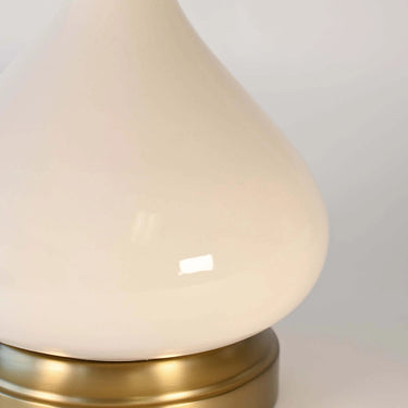 Ivory ceramic cordless table lamp with classic linen drum shade