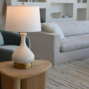 Bartlett cordless LED table lamp with ivory ceramic body and brass accents