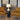 Luxury cordless table lamp with antique brass details and linen shade