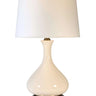 Decorative ivory ceramic table lamp with rechargeable battery, brass accents and white linen shade