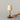Santa and Cole portable table lamp with beige parchment shade and natural birch wood finish