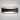 Besa Arc LED wall sconce in black finish mounted on a modern interior wall