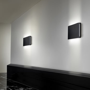 Besa Ponta wall sconce in a luxury hotel corridor setting