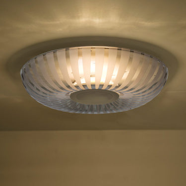 Toroid-shaped blown smoke glass shade with radial frosted stripes for modern ceiling lighting