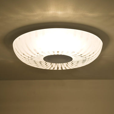 Handcrafted clear glass diffuser featuring frosted radial patterns for contemporary LED lighting