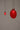 Sculptural glossy pure red hanging lamp with warm LED lighting