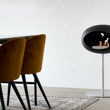 Dome Black Ground Steel Low Fireplace by Le Feu providing sustainable heat