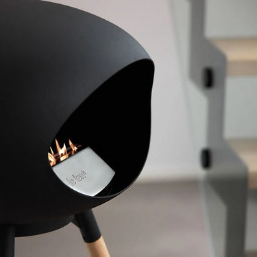 Le Feu Dome Black Ground Wood Low Fireplace in a contemporary interior