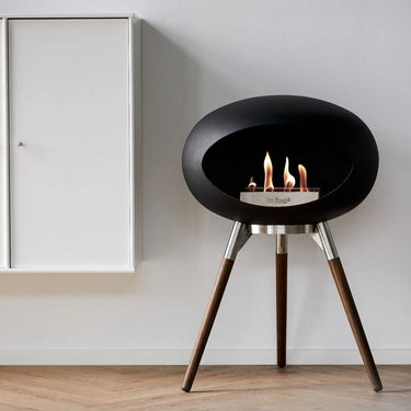 Le Feu Dome Black Ground Wood Low Fireplace as an indoor centerpiece
