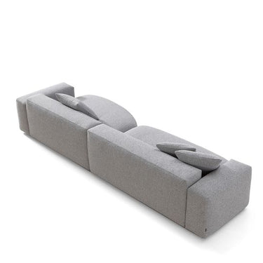 Bleecker modern designer sofa with medium grey bouclé fabric and plush cushions