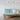 ET2 Blossom long branch pendant above a daybed sofa with teal cushions