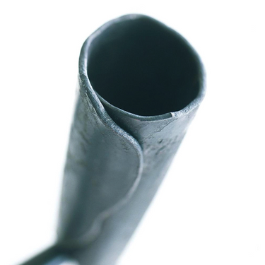 Conmoto Ferro & Fuoco Fireplace Tools, close-up of a forged tool end