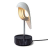 Chirp by Daqiconcept, porcelain bird above black marble