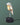 Chirp by Daqiconcept softly lit against sage green
