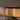 Close-up of the Avalon Oval alabaster cylinders glowing warmly beneath the dark frame