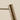 Close-up of the satin brass shade of the Heron table lamp