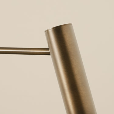 Close-up of the satin brass shade of the Heron table lamp