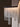 Close-up of the wavy kiln glass panels on the bronze Cascata chandelier