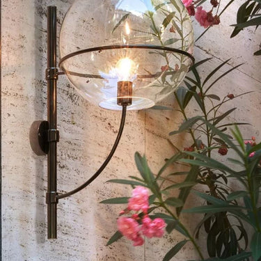 Modern exterior wall lighting fixture for patios and terraces, Lyndon wall lamp Oluce design
