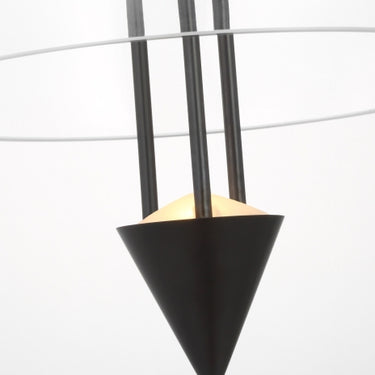 Cathedral Pendant Light in Dark Bronze, creating a warm and inviting ambiance in a living room. 