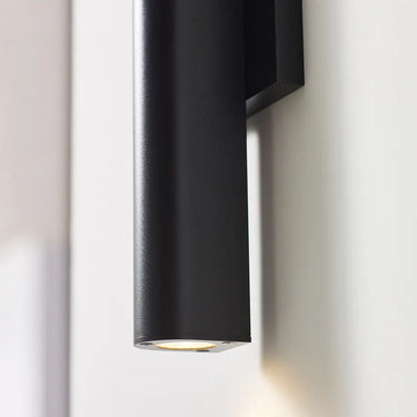 Chara 16 black LED exterior sconce, demonstrating powerful up and down light distribution.