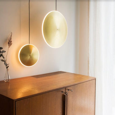 Graypants Chrona vertical pendant dimmed showing warm 2700K ambient LED glow.