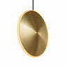 Graypants Chrona 10-inch vertical pendant - modern round spun brass disc light.