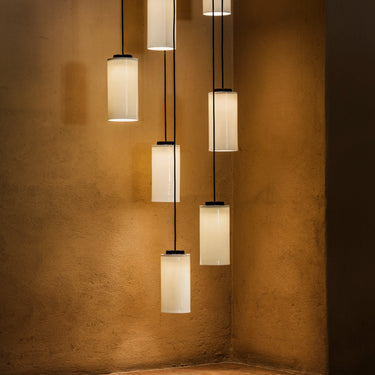Santa & Cole Cirio Cascada chandelier with opal glass shades and warm 2700K lighting
