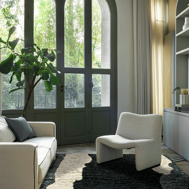 Clair Obscur hemp rug, styled in a room