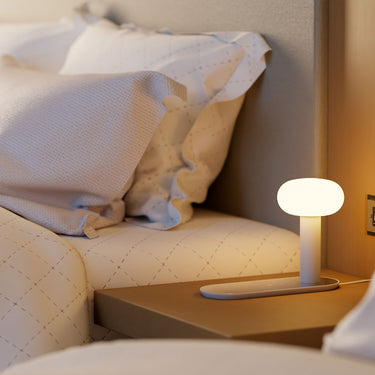 Energy-efficient Combi Table Lamp by Koncept with matte black finish and compact modern design