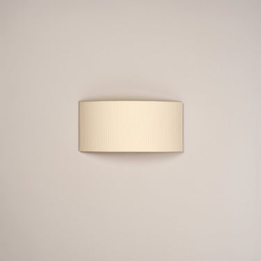 Minimalist rectangular wall lamp with handcrafted Natural Ribbon shade and chrome structure
