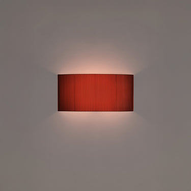 Comodin Rectangular Wall Lamp by Santa & Cole in Red-Amber Ribbon finish with warm ambient LED lighting