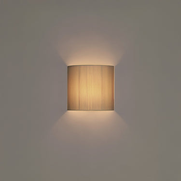 Natural Ribbon Comodin wall light by Santa and Cole for bedroom and hotel interiors