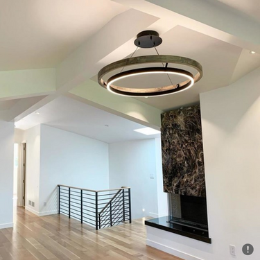 Modern wood and metal LED chandelier with matte black frame and weathered oak accents