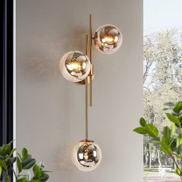 Modern brass wall sconce for bathroom lighting