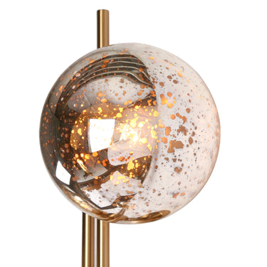 Glamorous gold wall sconce with round backplate
