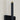 Photo of black and brass frame on the Crosby modern globe wall sconce.