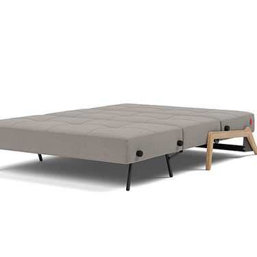 Innovation Living Cubed sofa converted into a full size bed in grey fabric