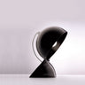 Black DALU table lamp by Artemide with curved thermoplastic body for modern desks or bedside lighting
