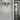 Oluce Dancing Glass wall lamp mounted on a wall, lifestyle view