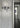 Oluce Dancing Glass wall lamp mounted on a wall, lifestyle view