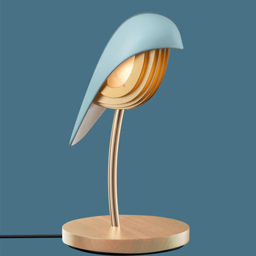 Modern white desk with the Daqiconcept Bird LED Dimmable Desk Lamp - Aqua Blue